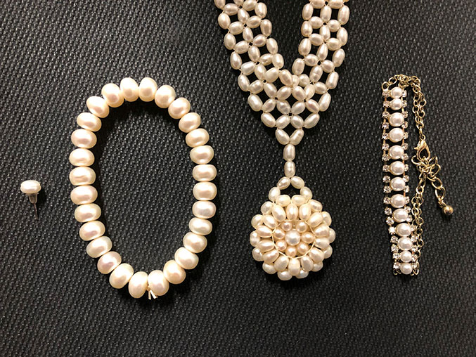 Pearl samples from left to right are 1) an earring, 2) a bead bracelet, 3) a bead necklace, and 4) a chain bracelet with beads. 