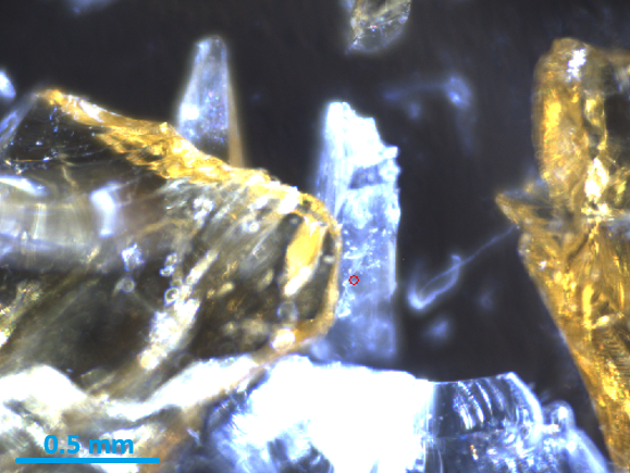 Simulated sample consisting of clear and amber glass fragments.