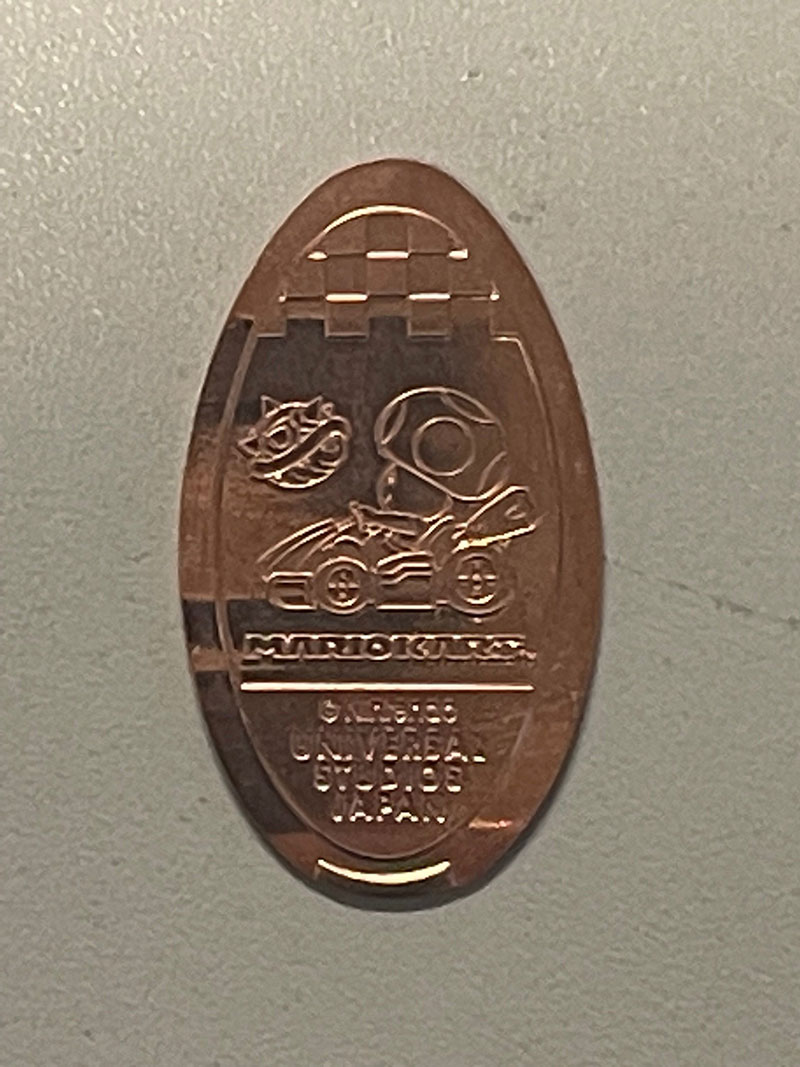 A pressed coin from Universal Studios.