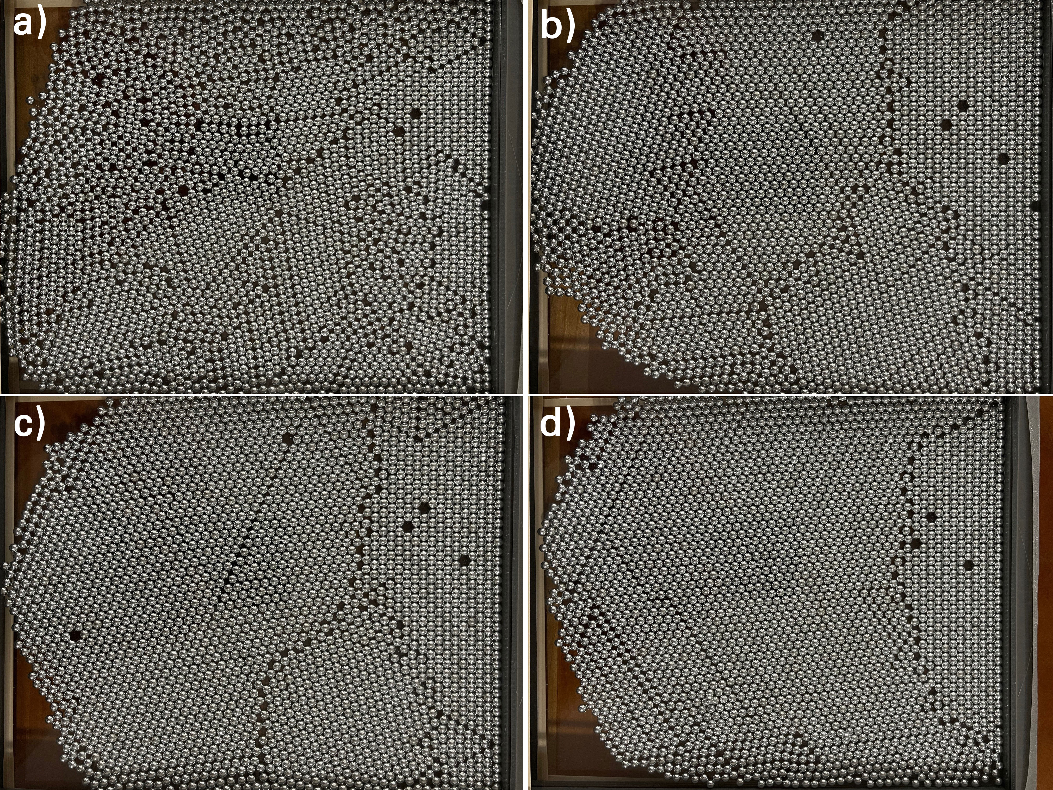 a) The initial distribution and b-d) the evolution of the 2D model structure as energy is input into the system through tapping and shaking the model.