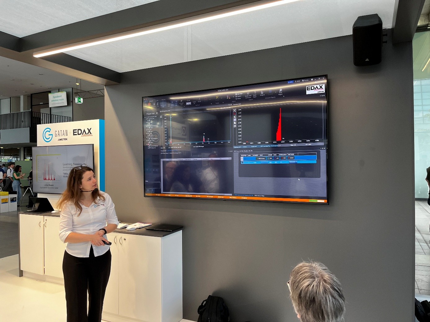 Julia Mausz discusses Spectrum synergy: The complementary powers of EDS and WDS with customers at MC.